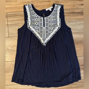 Navy embroidered sleeveless blouse